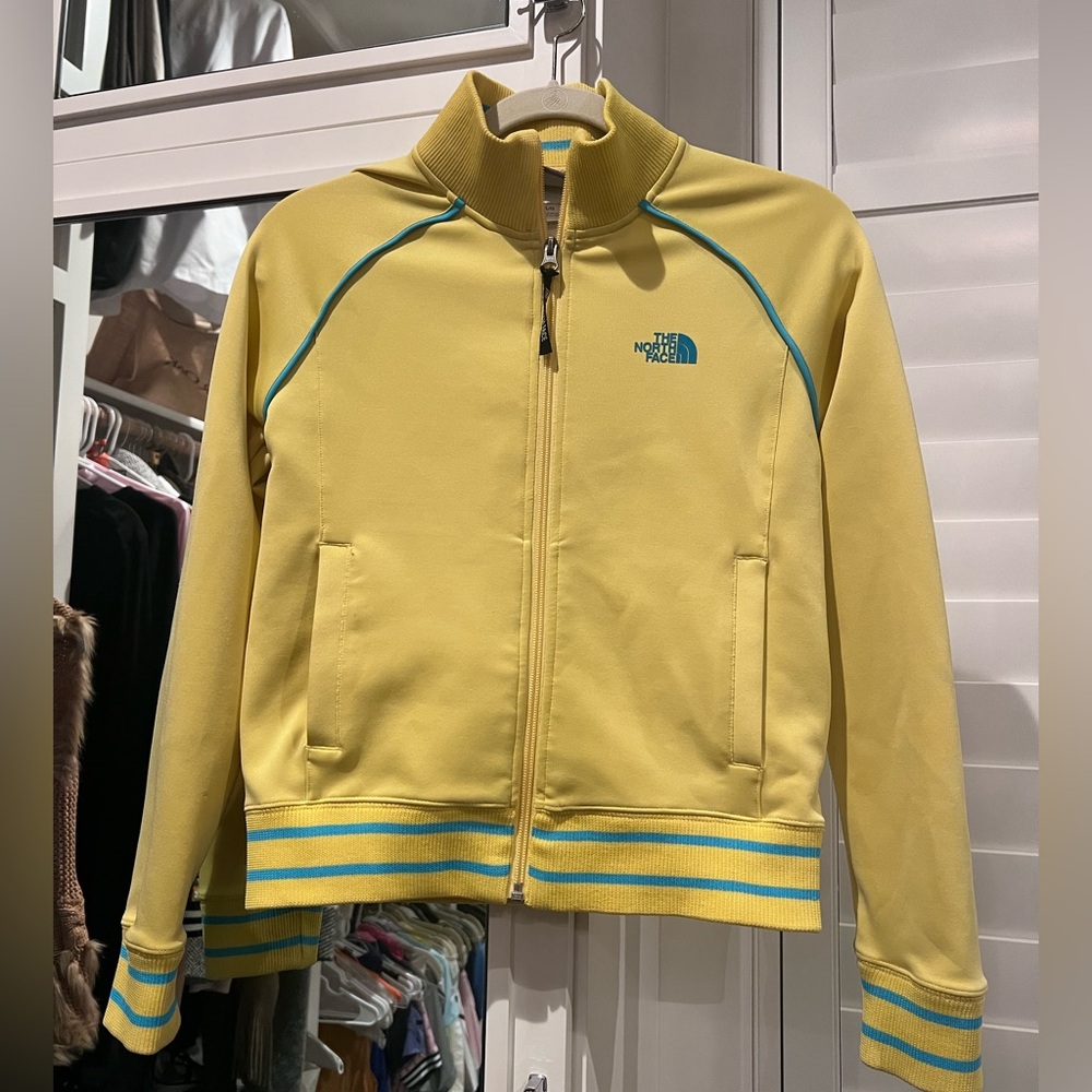 The North Face Yellow Track Jacket with Teal Details